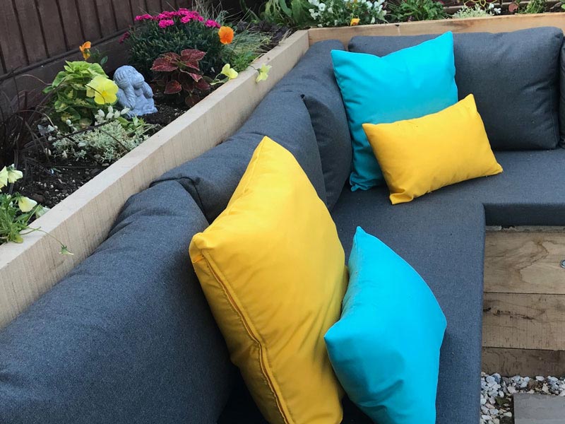 Re-covered seat cushions for a garden dining/lounge area