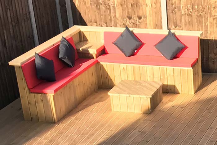 Outdoor seat cushions for a wooden picnic table